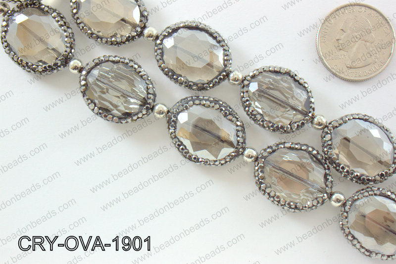 Oval smokey crystal with Gunmetal Rhinestone bezel 19x24mm