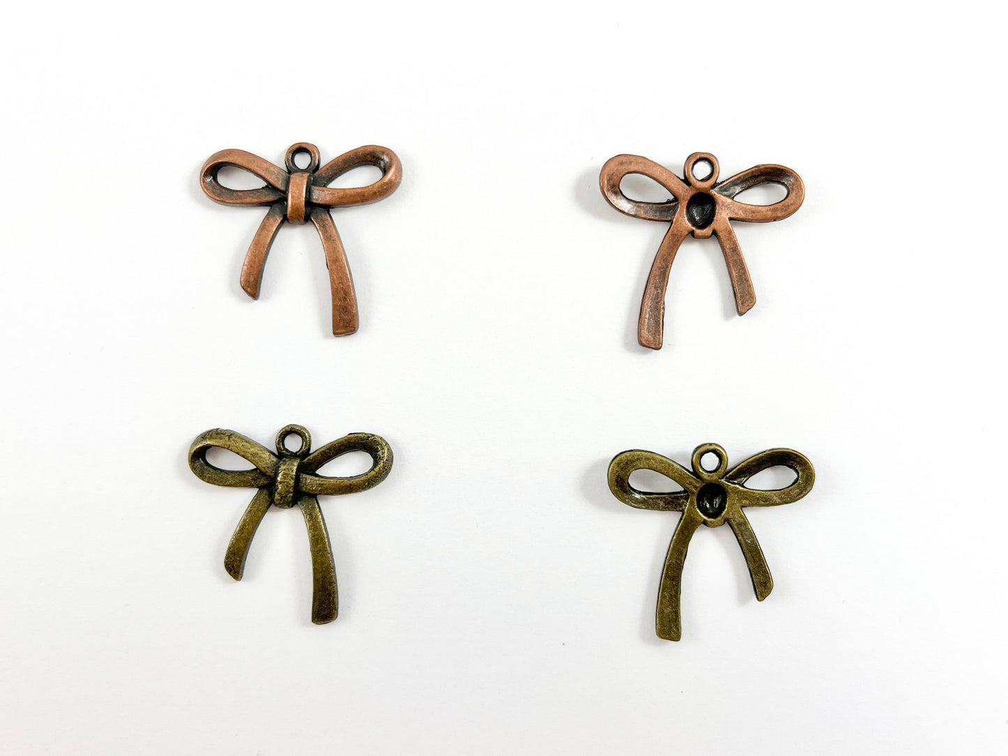 26x25mm Pewter Christmas Bow Tie Charm in Antique Copper and Brass 125 Grams Bag