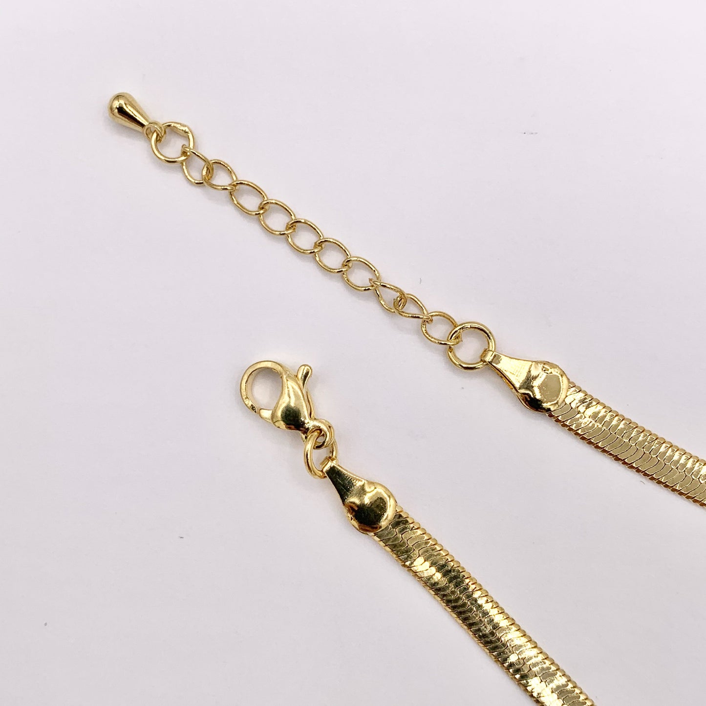 Herringbone Flat Step Cut Snake Chain Bracelets 7" with 1.2" Extension in 18K Gold Plated Copper 5 PCS