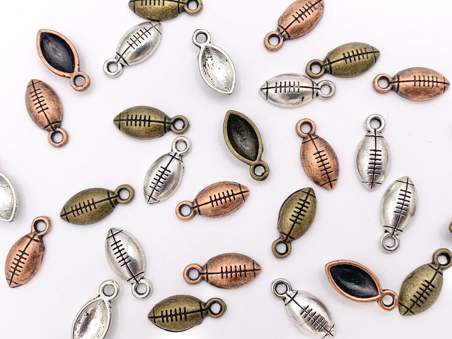 7x15mm Pewter One Sided Tiny Football Charms Small Curved Sports Charms Bulk Order in  Silver, Copper and Brass 125G